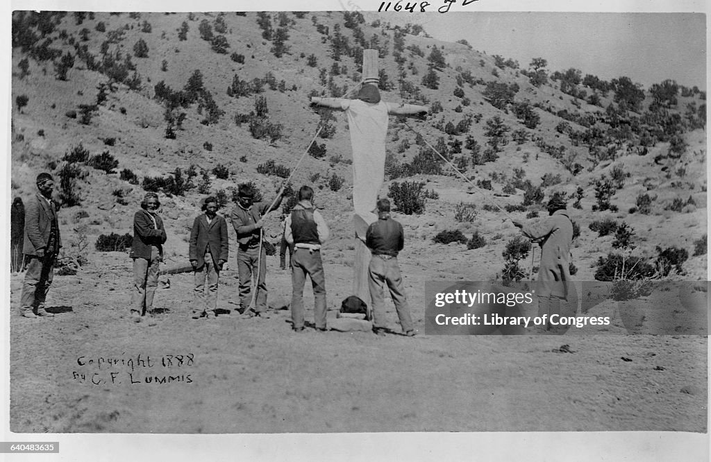 Native Americans Errecting a Crucifix