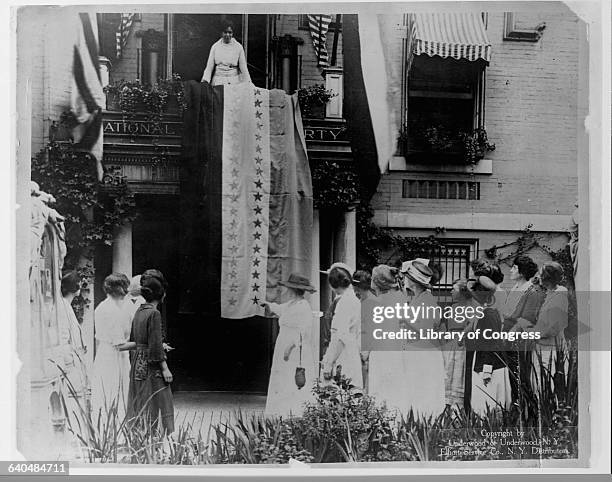 Group of suffragists gather at the headquarters of the National Women's Party to celebrate the passage of the 19th Amendment. The 19th Amendment...