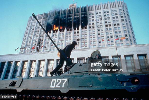 Soldier stands atop a tank at the Russian White House on October 4, 1993. Opponents of President Boris Yeltsin, led by ousted vice president...