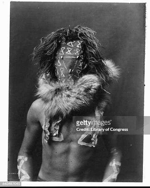 Photograph of a figure representing Tobadzischini, the Navajo war god, published in Volume I of The North American Indian by Edward S. Curtis.