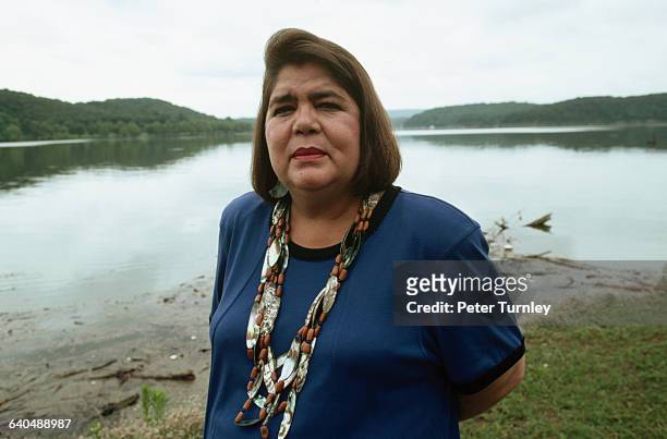 Wilma Mankiller, principal chief of the Cherokee Nation, poses beside a lake. Mankiller was the first female principal chief in the history of the...