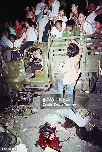 On the night of June 3rd, and into June 4th, soldiers from the People's Liberation Army with orders to clear Tiananmen Square fired on Beijing...
