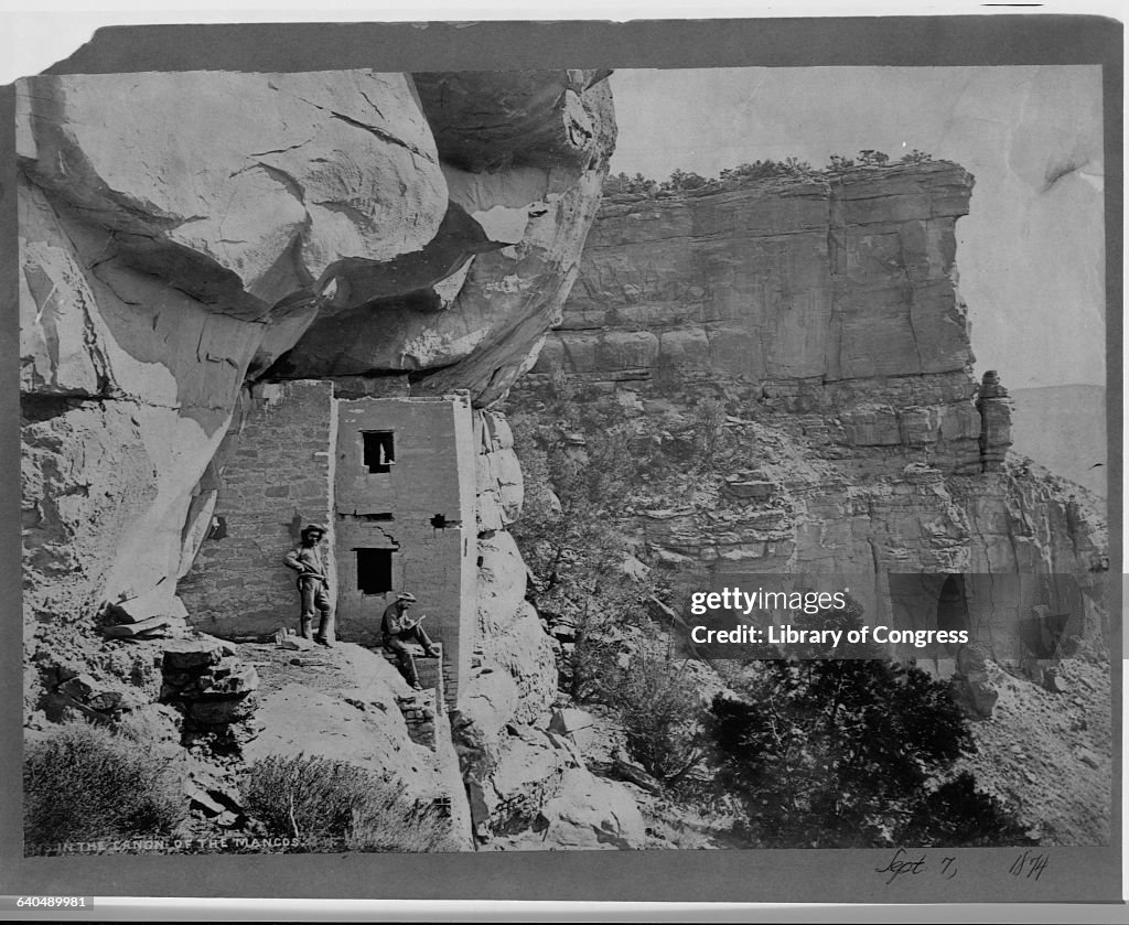 Two Men Next to the Ruins of Cliff Dwelling in Colorado, 1874