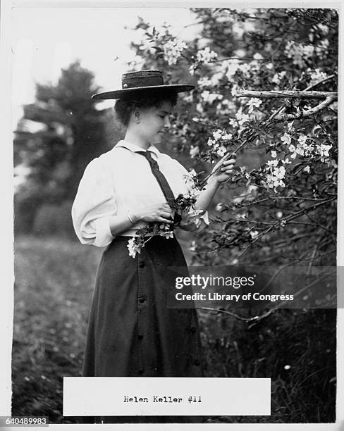 Helen Adams Keller in a garden.