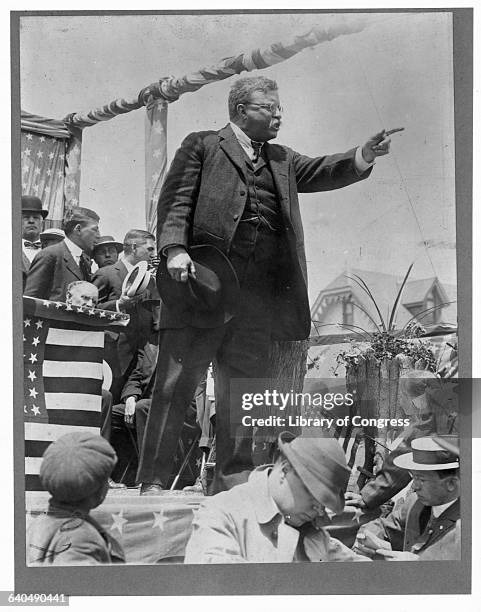 Theodore Roosevelt speaks from a platform during a political campaign,probably one of his own presidential campaigns . Roosevelt, a Republican, first...