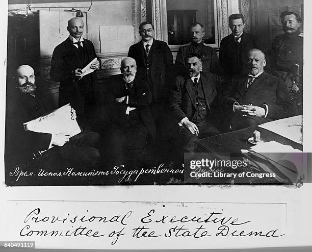 The leaders of Russia's State Duma Committee, after the first revolution of 1917. The leader, Kerensky, is standing second from right; others include...