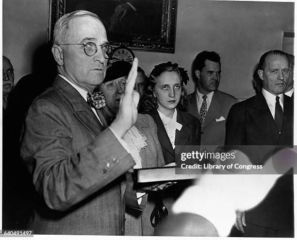 Vice President Harry Truman takes the Presidential oath of Office in the White House after the death of President Franklin Roosevelt. April 12, 1945.