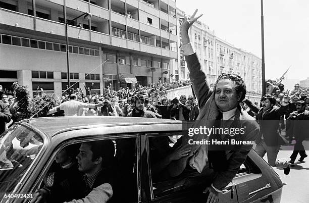 Lisboans gather in the streets to greet exiled socialist leader Mario Soares' comeback authorized by the Junta, three days after the April 25 coup...