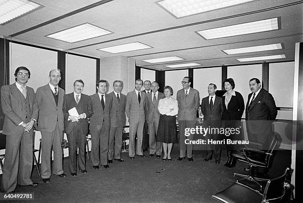 Jacques Chirac and RPR staffers gather for a group photo with Mr. Turcat , Jean Tiberi , Alain Juppe , Mr. Monod and Charles Pasqua right.