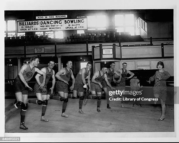 Vivian Marinelli leads the members of the Palace Club basketball team of Washington, D.C. In dancing the Charleston. They use it as a way to get fit...