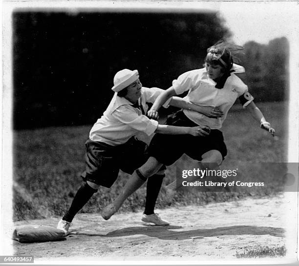 Mabel Harvey of McFarland School tags out Virginia Smoot of Columbia Jr. High School in a baseball game during a junior high school field day....