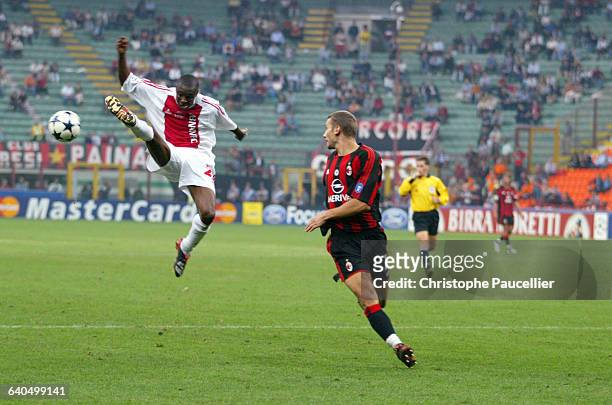 Soccer Champions League, First Round, Season 2003-2004 : AC Milan vs AFC Ajax. Andriy Chevchenko and Abubakari Yakubu . Football, Ligue des...