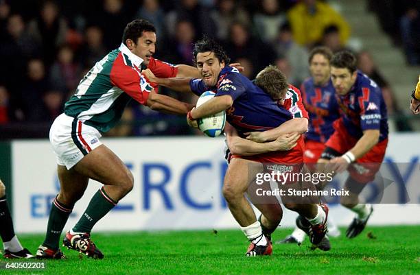 Rugby Heineken Cup 2003-2004. Pool 1. Round 1. Paris' Stade FranÃ§ais vs Leicester Tigers. Agustin Pichot and Ollie Smith . Rugby Heineken Cup...