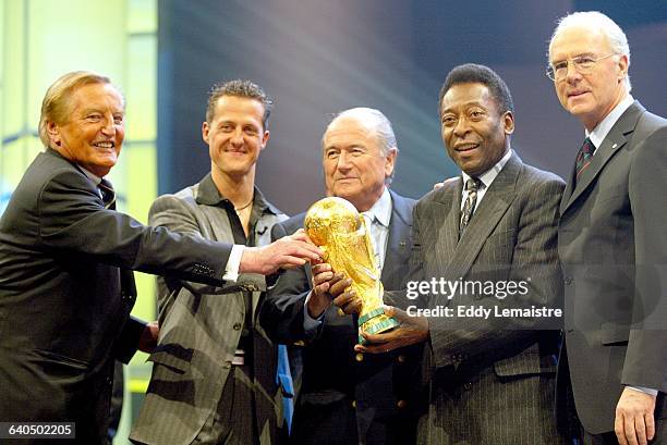 World Cup 2006 - Preliminary Draw. Gerhardt Mayer, President of the German Football Association, Michael Schumacher , F1 World Champion Driver,...