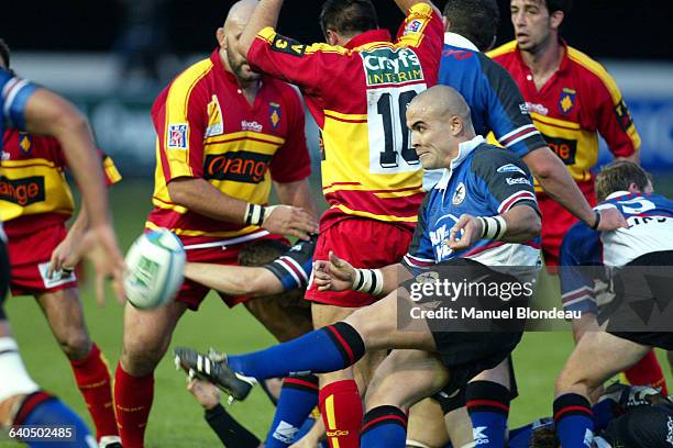 Sililo Martens of the Celtic Warriors kicks the ball during a Group 6 game against Perpignan in the 2003-2004 Heineken Cup.