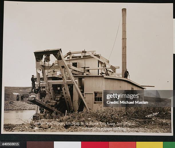 Flodin Gold Mining and Dredging Company's dredger number 1, on the Solomon river, in Nome, Alaska, September 21st, 1910. The dredger was constructed...