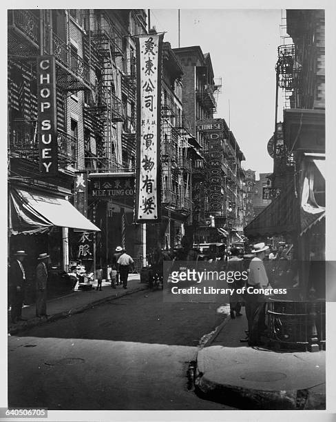 Busy commercial street in Chinatown, San Francisco, ca. 1920s. | Location: Chinatown, San Francisco, California, USA.