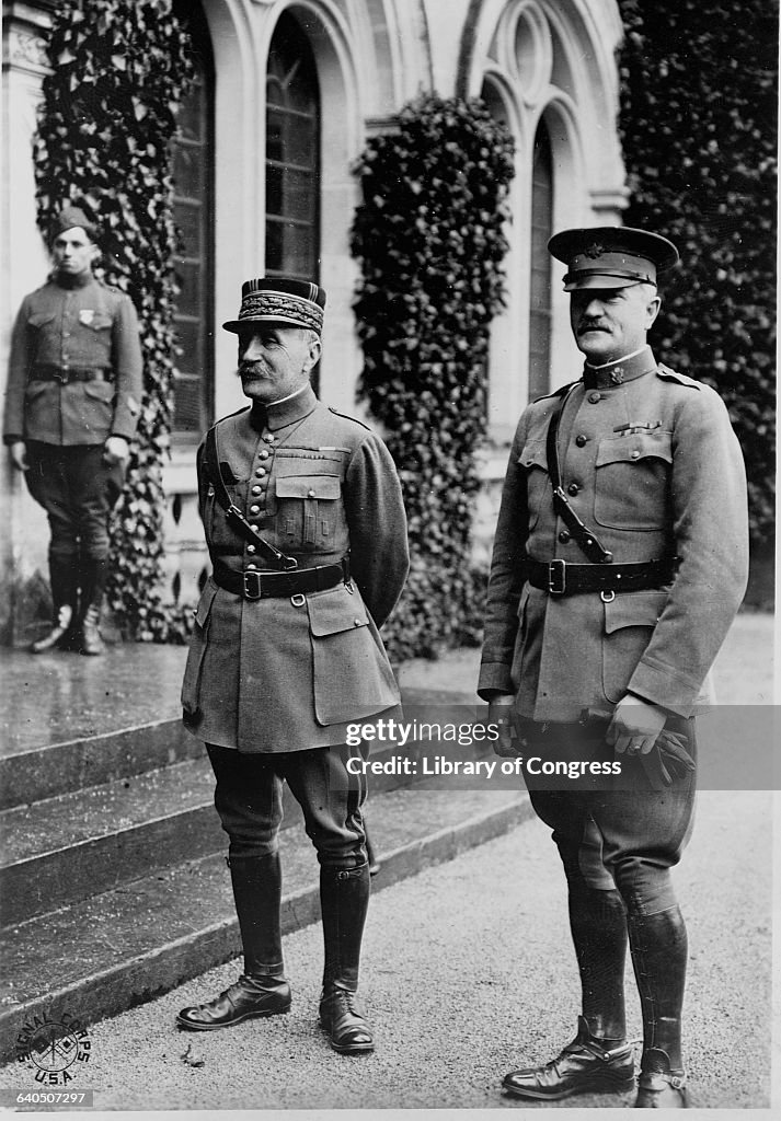 Commander Rench French Army Commander Ferdinand Foch stands next to John J. Pershing ...