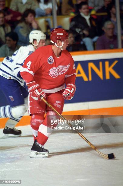 Mark Howe of the Detroit Red Wings turns up ice against the Toronto Maple Leafs on October 31, 1992 at Maple Leaf Gardens in Toronto, Ontario, Canada.