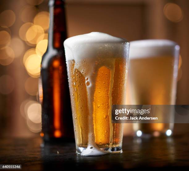 0117 beer - empty beer glass stock pictures, royalty-free photos & images