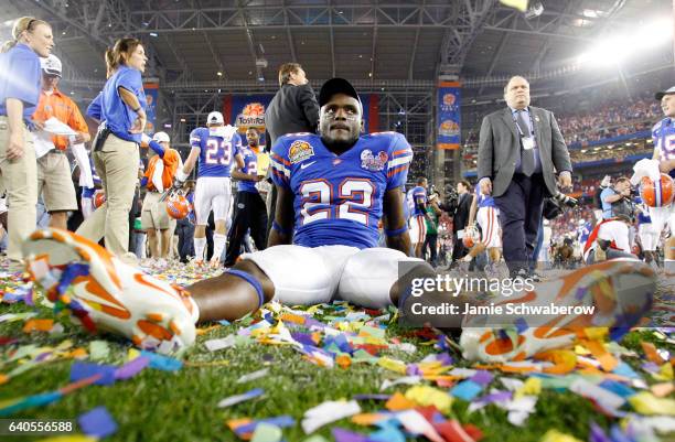 Cornerback Reggie Lewis of the University of Florida sits in shock after defeating the Ohio State Buckeyes during the BCS National Championship game...