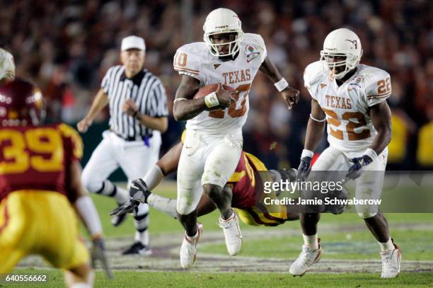 Vince Young of the University of Texas rushes for a big gain against the University of Southern California during the BCS National Championship Game...