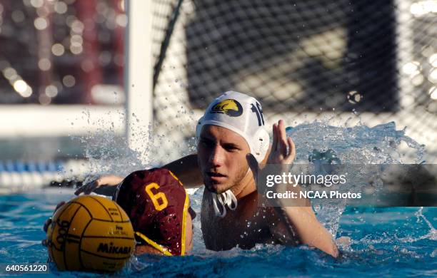 Zac Monsees of Cal-Berkeley tries to stop Juan Delgadillo of USC during the Division I Men's Water Polo Championship held at the Burns Recreation and...