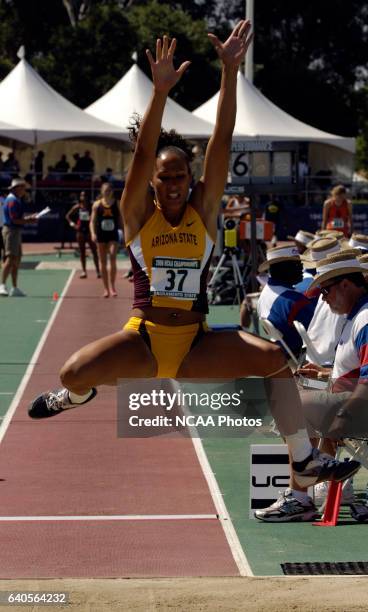 Jacquelyn Johnson of the University of Arizona State competes in the Women's Heptathlon final. Johnson won with a jump of 6.09m and accumulated 877...