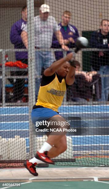Cal-Bakersfield's Cecilia Barnes spins towards releasing a winning throw of 19.04 m in the weight throw competition during the Division II Men's and...