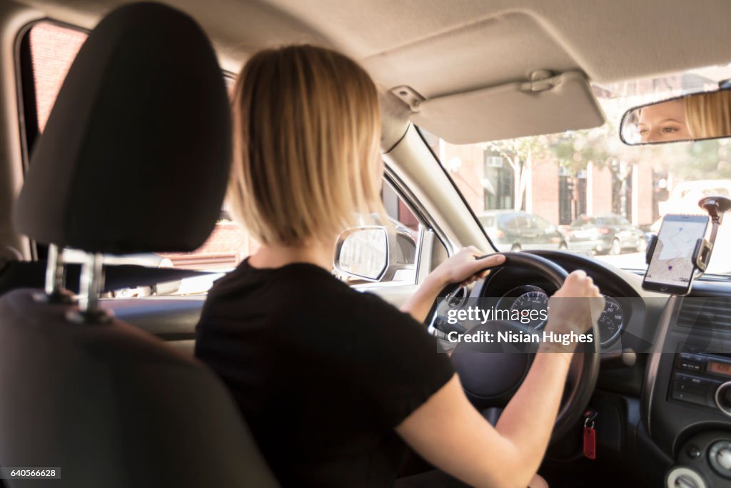 Woman driving car