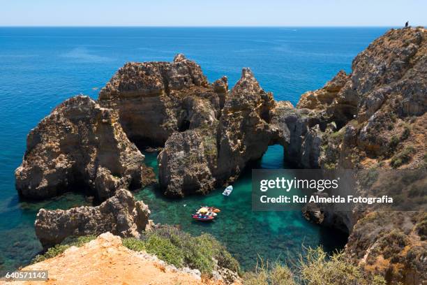 dona ana beach in lagos - veículo aquático fotografías e imágenes de stock