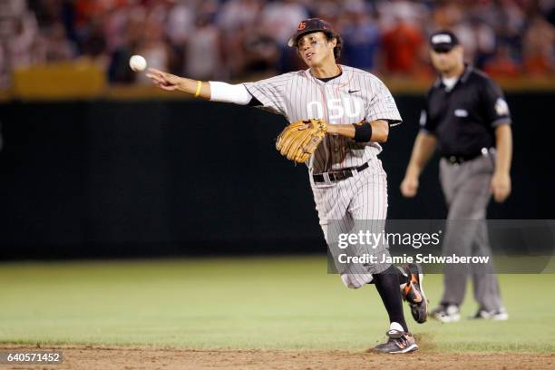 Second baseman Joey Wong of Oregon State University throws out a University of North Carolina runner during the Division I Men's Baseball...