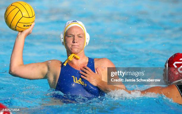 Kelly Rulon of UCLA looks for an open teammate against Lauren Silver of Stanford University during the Division I Women's Water Polo Championship...