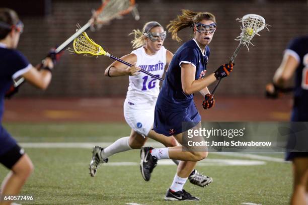 Brittany Kalkstein of the University of Virginia looks for an open teammate against Northwestern University during the Division I Women's Lacrosse...