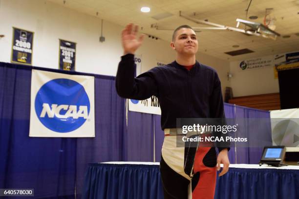 Michael Dickinson of Jacksonville State University waves to the crowd after winning the individual title of the air rifle competition during the...