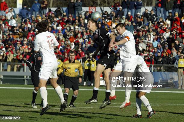 Andrew Boyens of the University of New Mexico out jumps Jason Garey of the University of Maryland for a header during the Division I Men's Soccer...