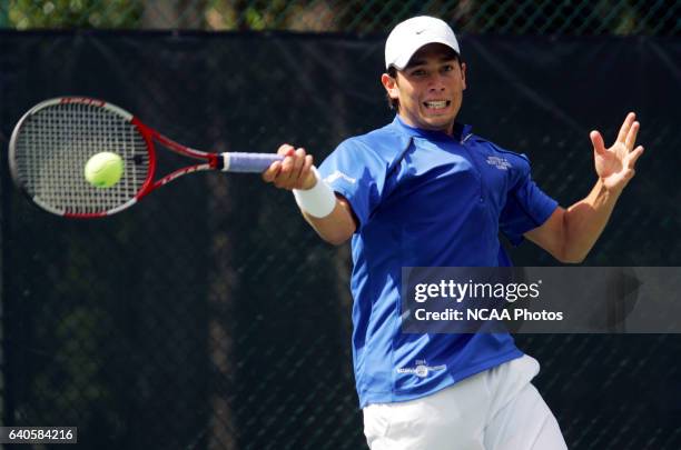 Mario Vergara of the University of West Florida hits a forehand against German Escallon of the University of North Florida during the Division II...