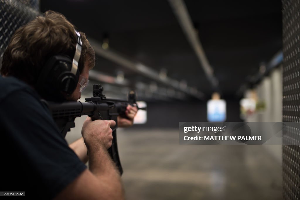 Man shooting assault rifle