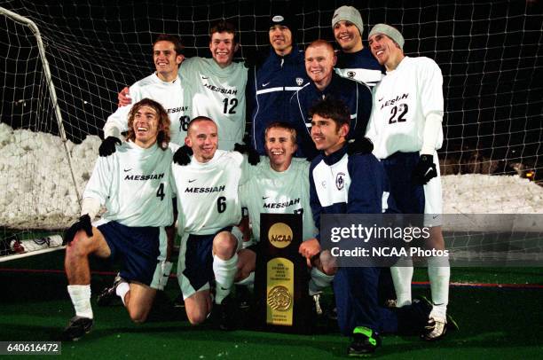 Messiah College teammates celebrate their victory over Otterbein College during the Division III Men's Soccer Championship held at Sandy MacAllaster...