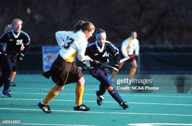 Becky Peterson of Rowan University and Amber Fulginiti of Messiah College battle for the ball during the Division III Women's Field Hockey...