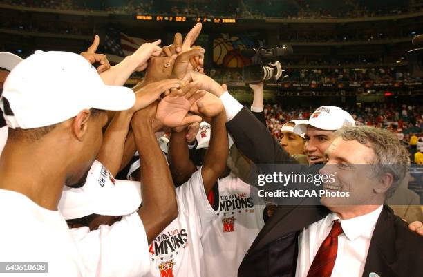 Head coach Gary Williams celebrates with his Maryland team following the NCAA Photos via Getty Images Men's Division I Basketball Championships held...