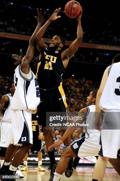 Jamie Skeen of Virginia Commonwealth University shoots over Khyle Marshall of Butler University during the semifinal game of the 2011 NCAA Photos via...