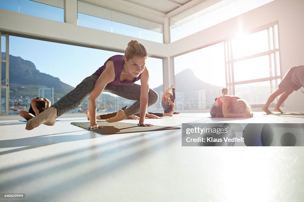 Woman doing yoga balance exercise