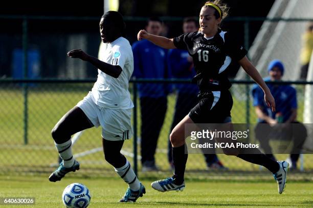 Kayla Addison of GVSU and Derith Fernandes of Saint Rose battle for the ball during the Division II Women’s Soccer Championship held at the Ashton...
