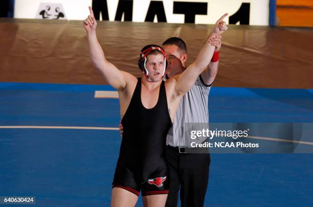 Aaron Denson of Nebraska-Omaha celebrates after defeating Charlie Pipher of Western State during the Division II Men's Wrestling Championship held at...