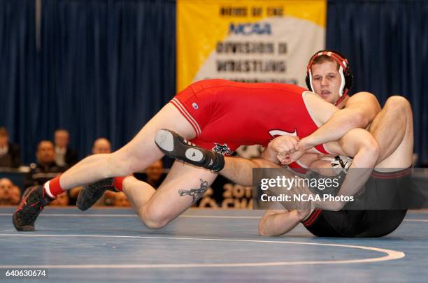 Aaron Denson of Nebraska-Omaha wrestles Charlie Pipher of Western State during the Division II Men's Wrestling Championship held at the UNK Health...