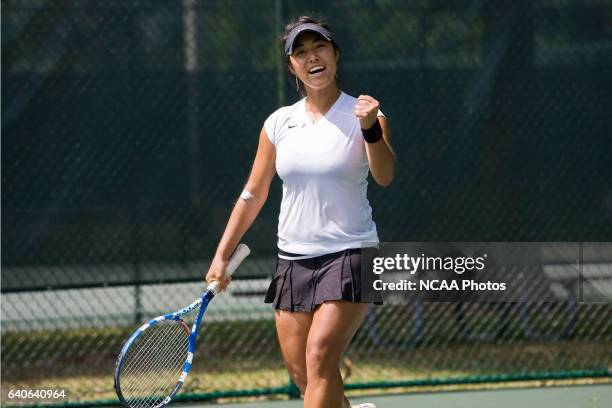 Jenny Chin of Bringham Young University-Hawaii celebrates her teams sole win over Armstrong Atlantic during the Division II Women's Tennis...