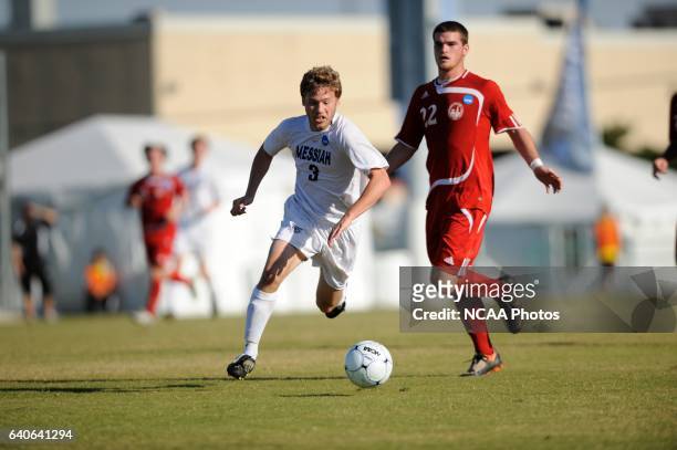 Geoff Pezon of Messiah College lines up the winning goal against Lynchburg College in overtime during the Division III Men's Soccer Championship held...