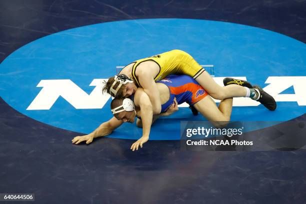 Maxwell Askren of Missouri wrestles Kirk Smith of Boise State during the Division I Men's Wrestling Championship held at the Qwest Center in Omaha,...