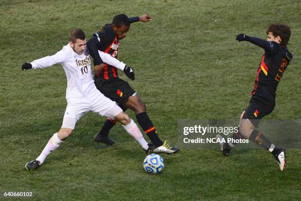 Harrison Shipp of the University of Notre Dame battles against Suli Dainkey from the University of Marlyand during the Division I Men’s Soccer...